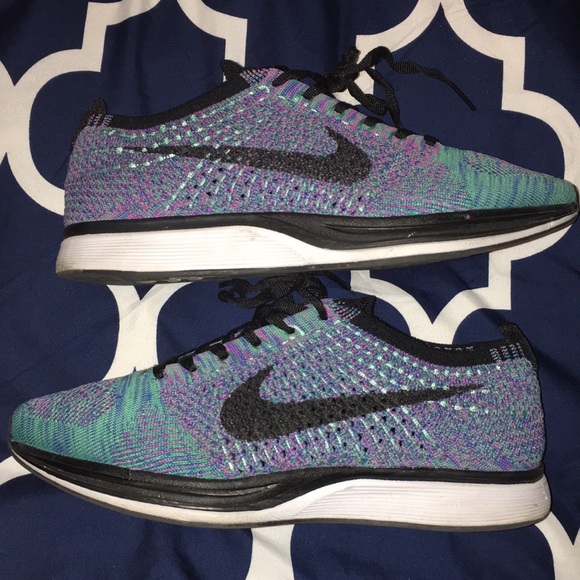 Nike Shoes - Rare Nike flyknit racer sneakers. Purple and teal.